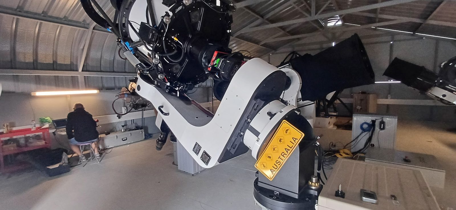 Large telescope mount with Australia sign in observatory
