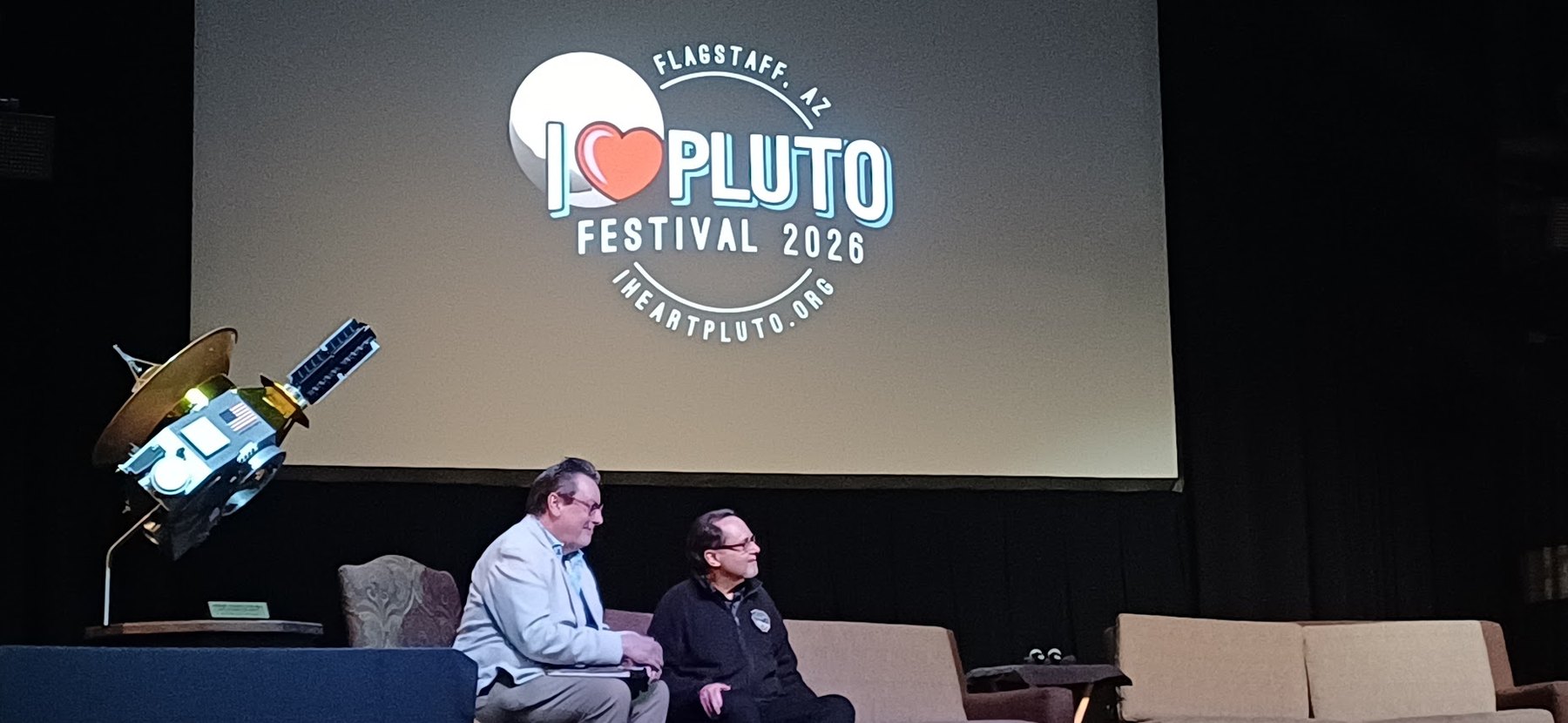 I Heart Pluto Festival 2026 astronomy panel and spacecraft model display